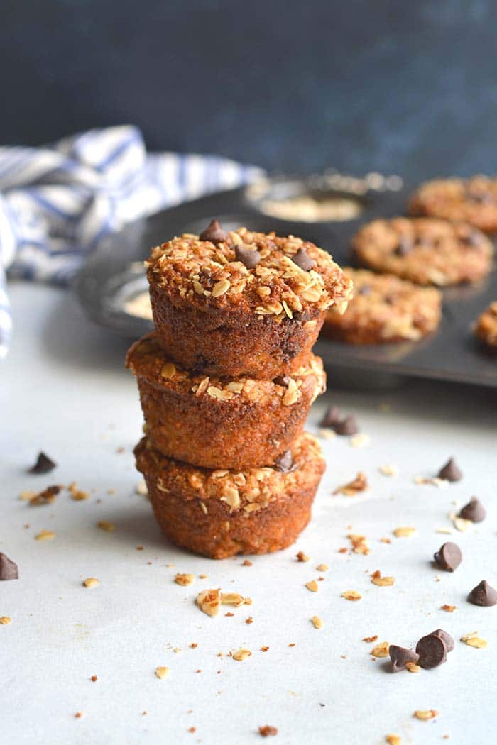 Healthy Greek Yogurt Muffins are low calorie chocolate chip muffins made with gluten free oats. Topped with a cinnamon streusel, they are a perfectly portioned snack! Gluten Free + Low Calorie