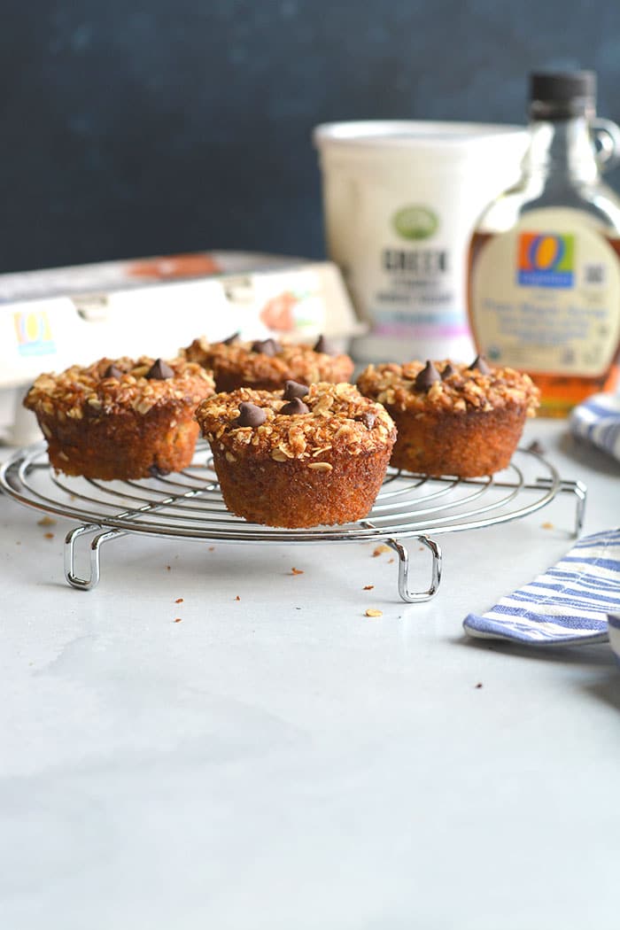 Healthy Greek Yogurt Muffins are low calorie chocolate chip muffins made with gluten free oats. Topped with a cinnamon streusel, they are a perfectly portioned snack! Gluten Free + Low Calorie