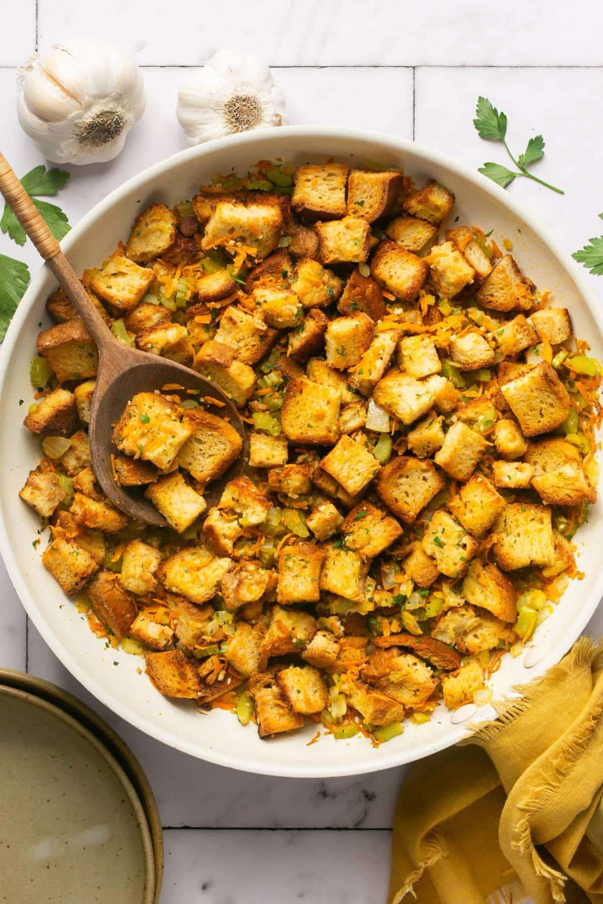 Healthy Stovetop Stuffing is made low calorie with more vegetables and gluten free bread. A delicious and healthier stuffing recipe! Gluten Free + Low Calorie + Vegan