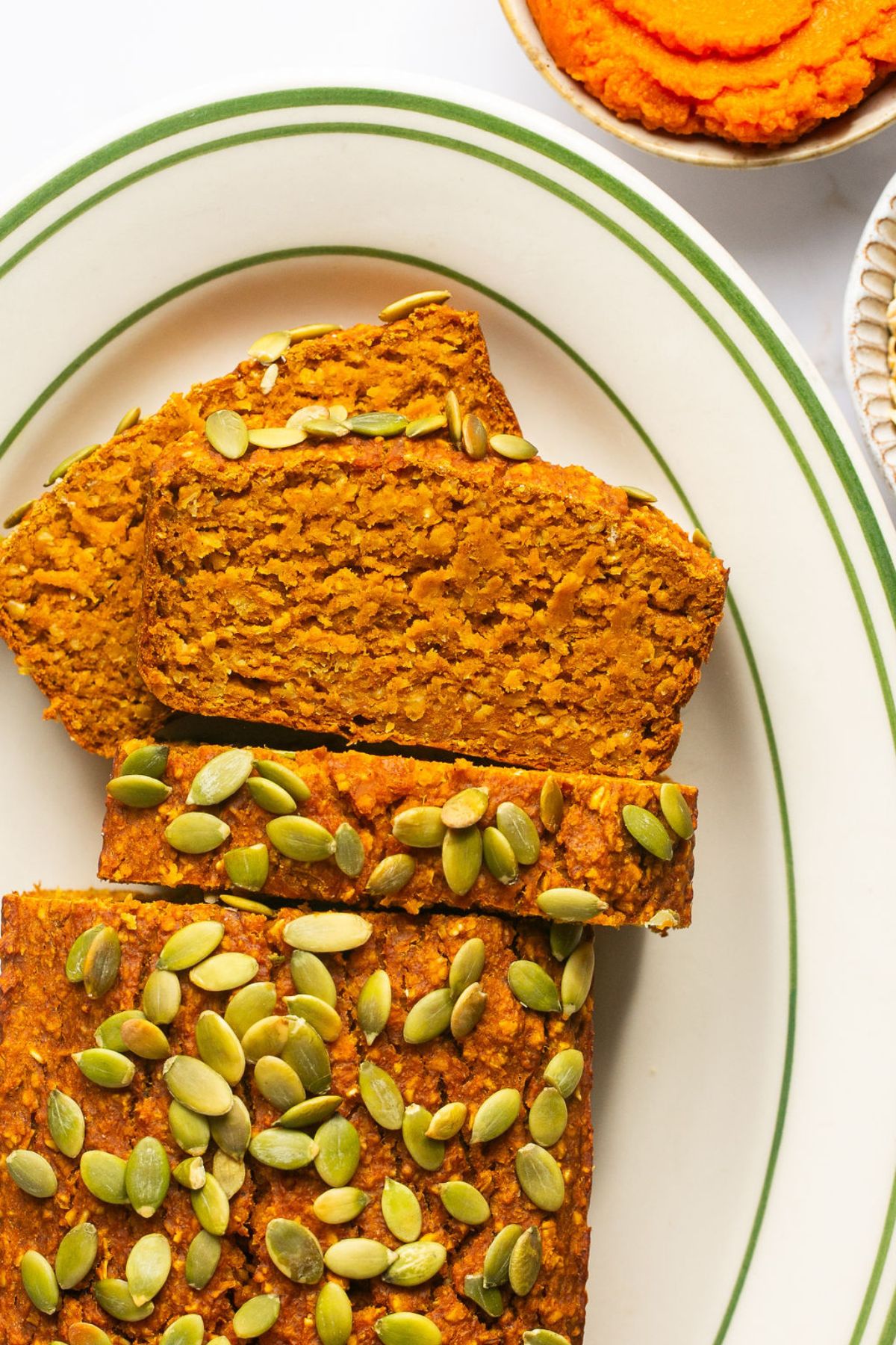 Healthy Pumpkin Oat Bread made flourless with gluten free oats and lightly sweetened. A naturally low calorie, low fat, low sugar snack. Low Calorie + Gluten Free