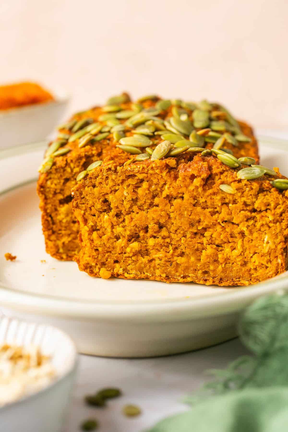 Healthy Pumpkin Oat Bread made flourless with gluten free oats and lightly sweetened. A naturally low calorie, low fat, low sugar snack. Low Calorie + Gluten Free