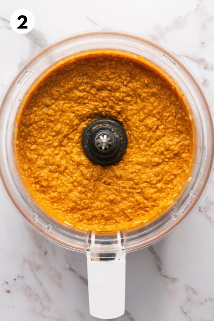 Ingredients mixed together in a food processor bowl. 