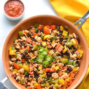 Healthy Turkey Skillet Burrito is a low calorie dinner recipe that is high protein and high fiber. The perfect weight loss meal! Gluten Free + Low Calorie
