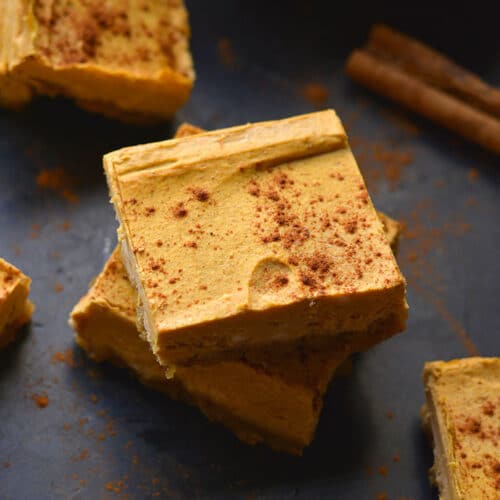 Healthy Pumpkin Cheesecake Bars is a low calorie cheesecake dessert recipe made higher protein and with a gluten free crust! Gluten Free + Low Calorie