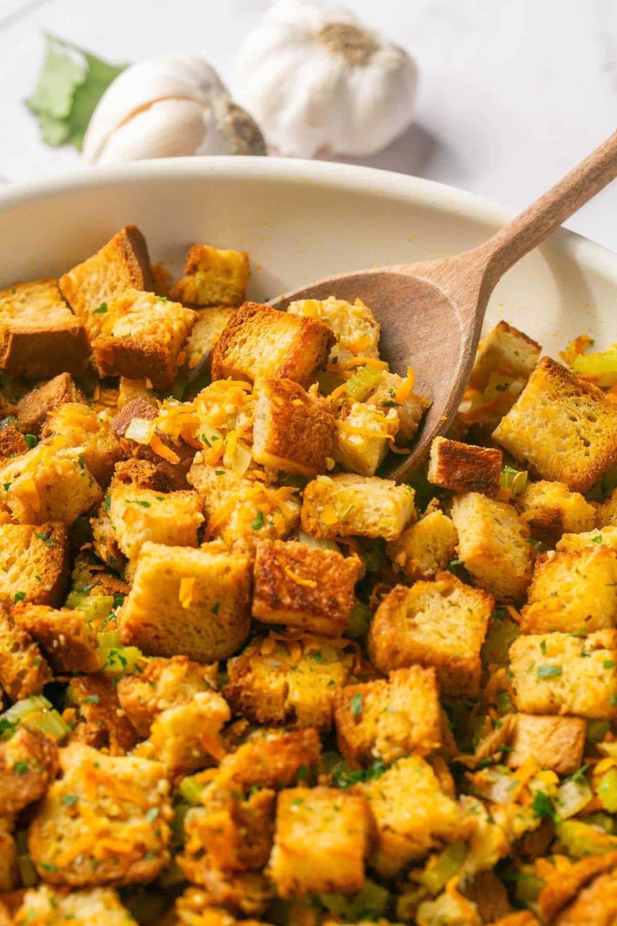 Healthy Stovetop Stuffing is made low calorie with more vegetables and gluten free bread. A delicious and healthier stuffing recipe! Gluten Free + Low Calorie + Vegan