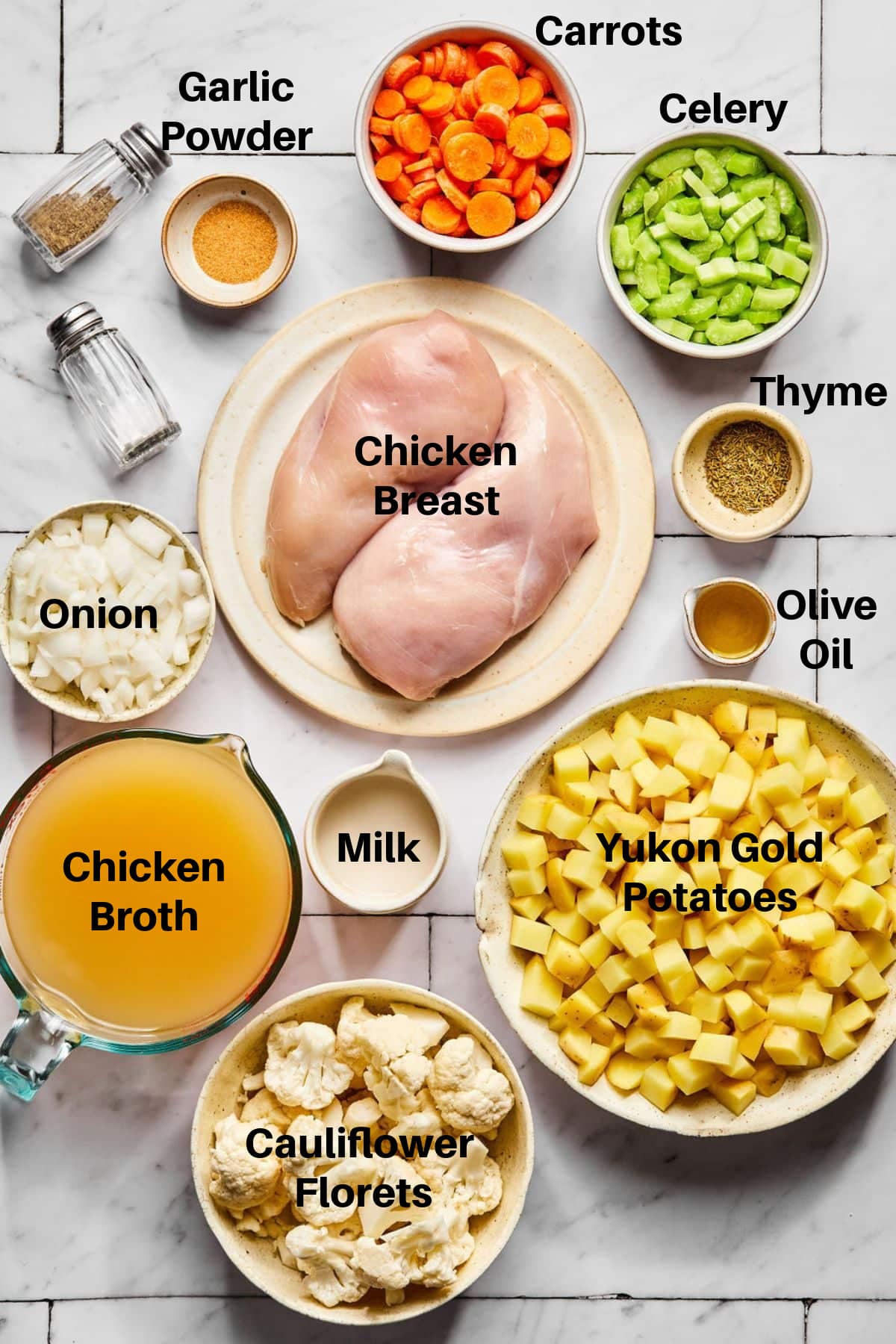 Ingredients to make chicken pot pie soup healthier on the table.
