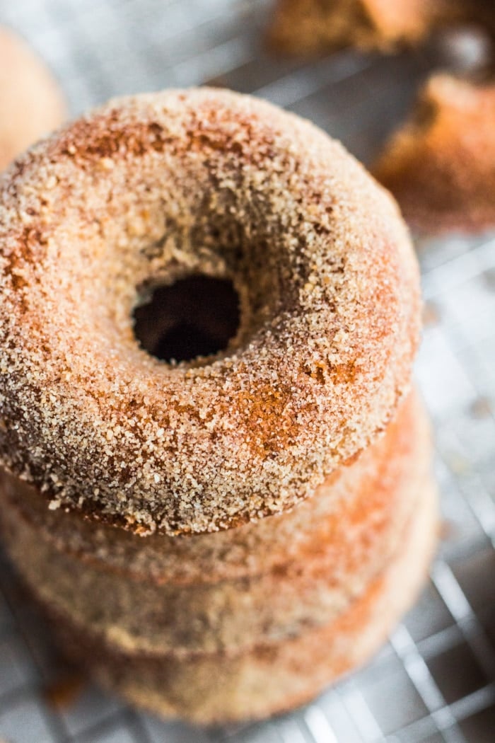 Healthy Gingerbread Donuts made lower calorie, gluten free and with wholesome, real ingredients. A lighter and healthier holiday treat dusted with a light maple sugar topping. Gluten Free + Low Calorie