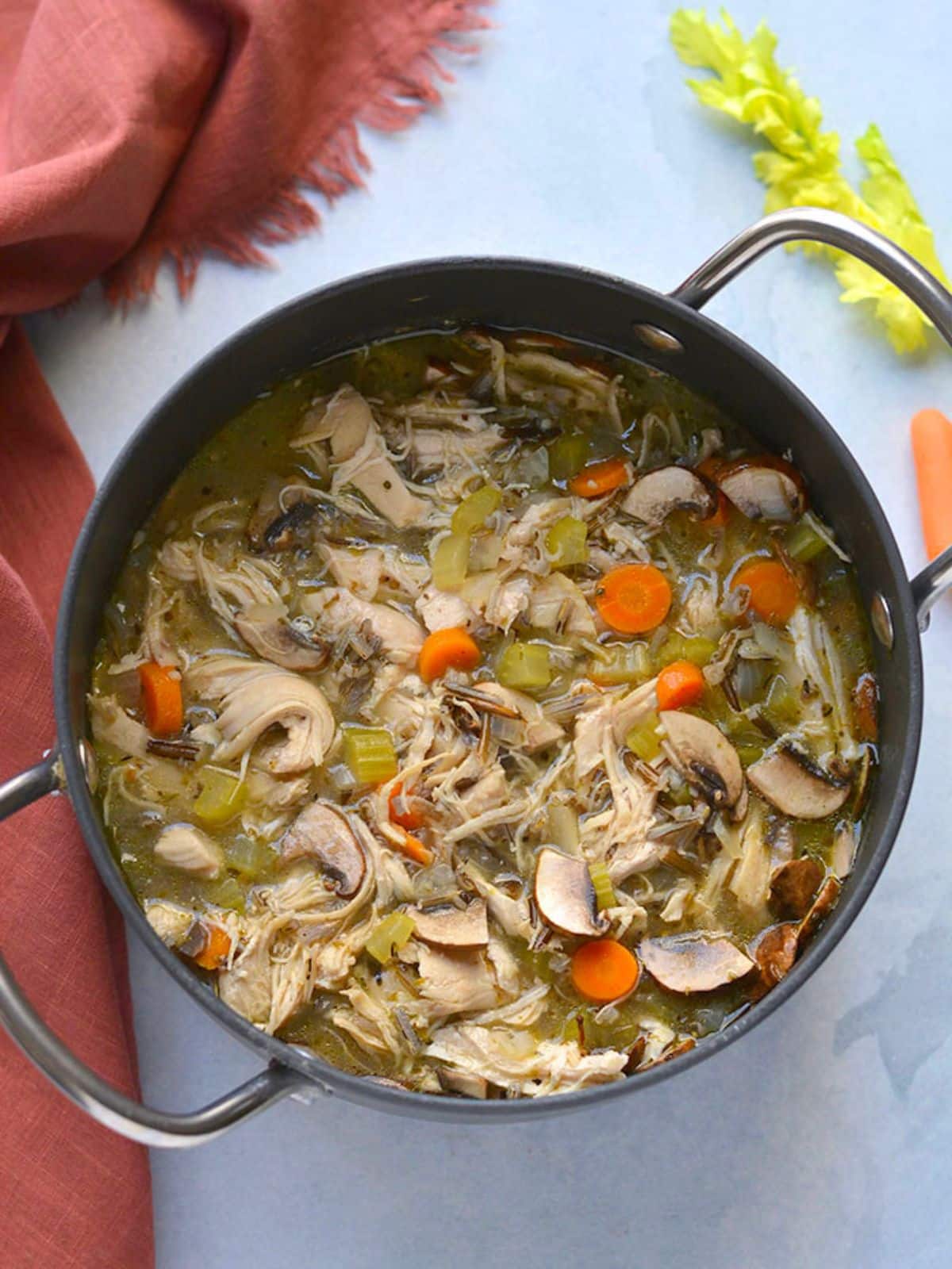 Turkey and wild rice soup in a bowl.