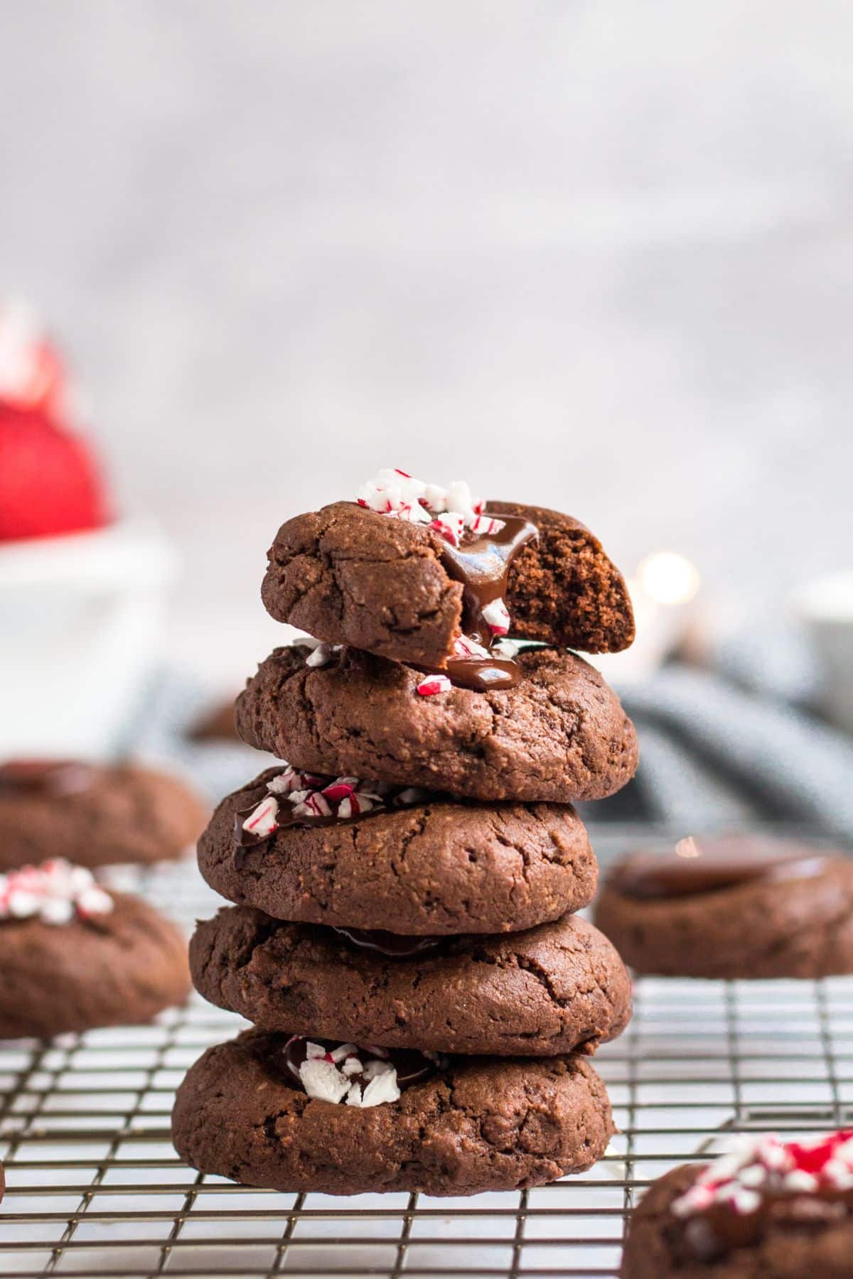 A stack of chocolate thumbprint cookies.