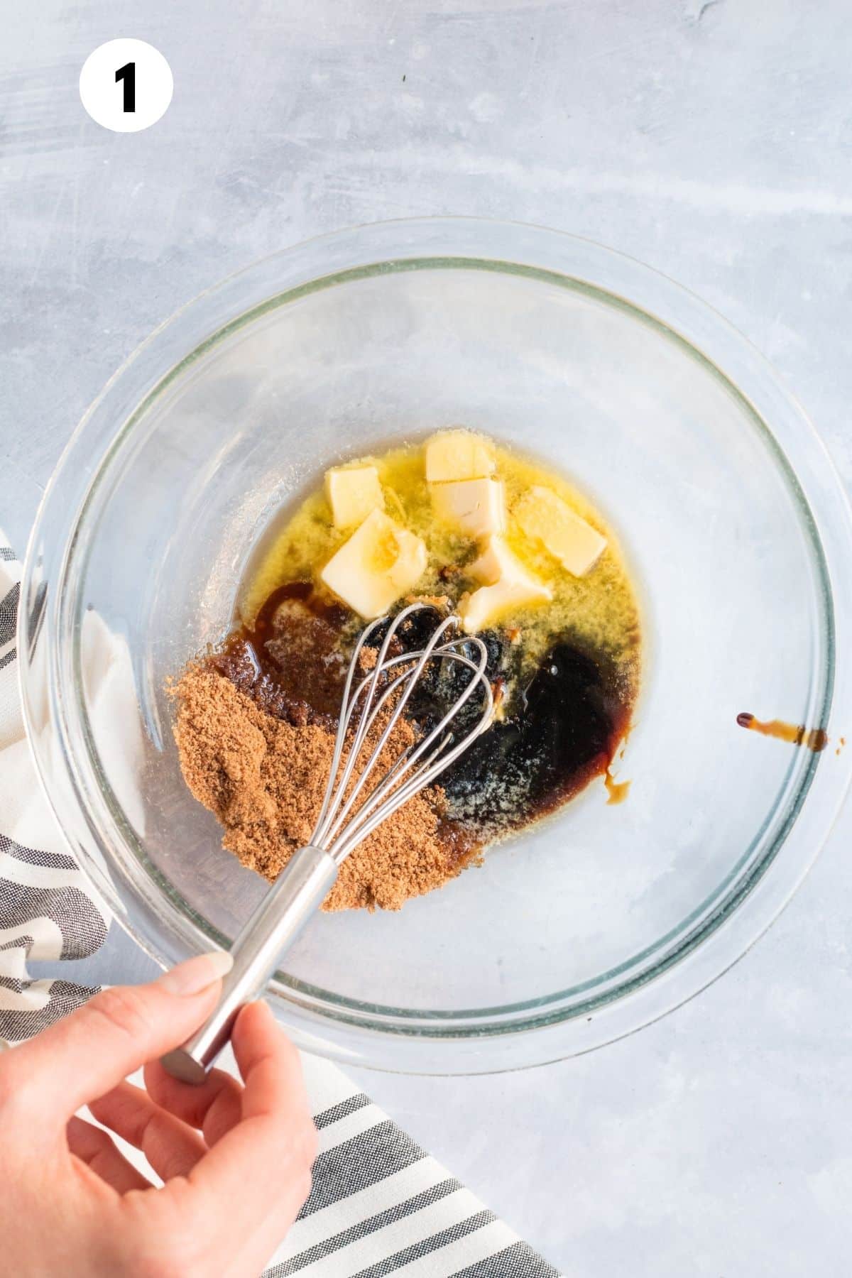 Ingredients for making gingerbread donuts together in a mixing bowl.