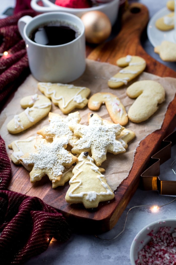 Healthy Sugar Cookies made low calorie, gluten free with an easy sugar free icing! A simple sugar cookie recipe that's lighter and healthy. Gluten Free + Low Calorie