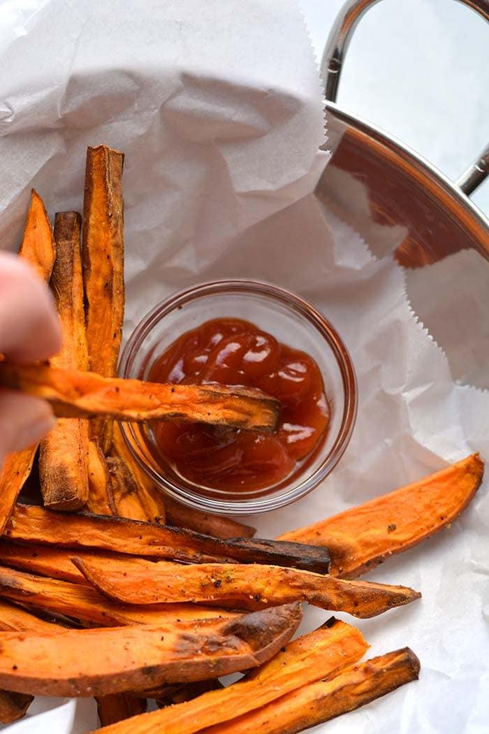 Healthy Air Fryer Sweet Potato Fries are a low calorie side made easy in an air fryer. Deliciously crispy and fried without the oil.