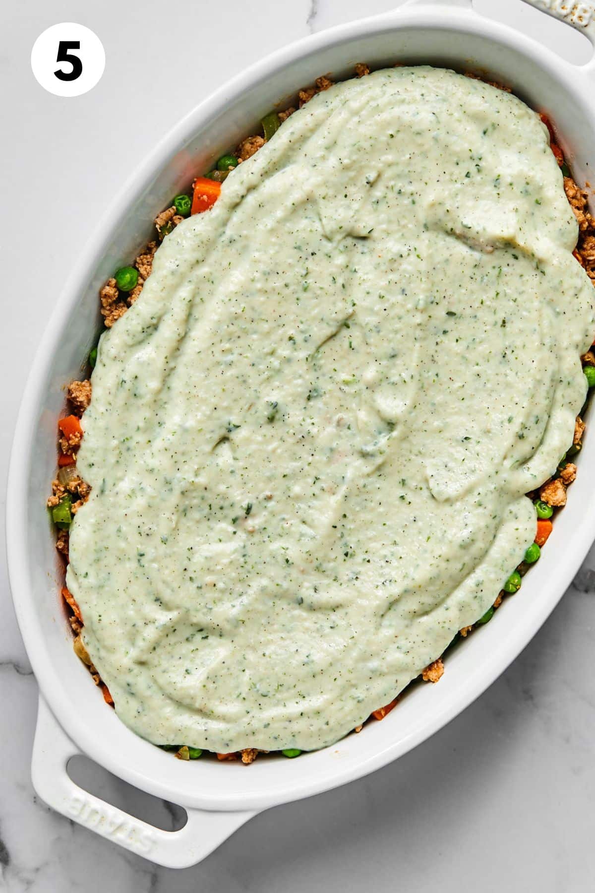 Cauliflower mash spread on top of the sheperds pie.