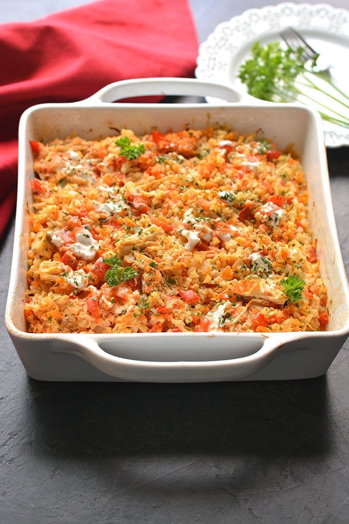Healthy Buffalo Chicken Casserole is baked buffalo chicken recipe with cauliflower rice. A super simple and delicious one pan meal that is low calorie, low carb, gluten free, Paleo and Whole30 friendly.
