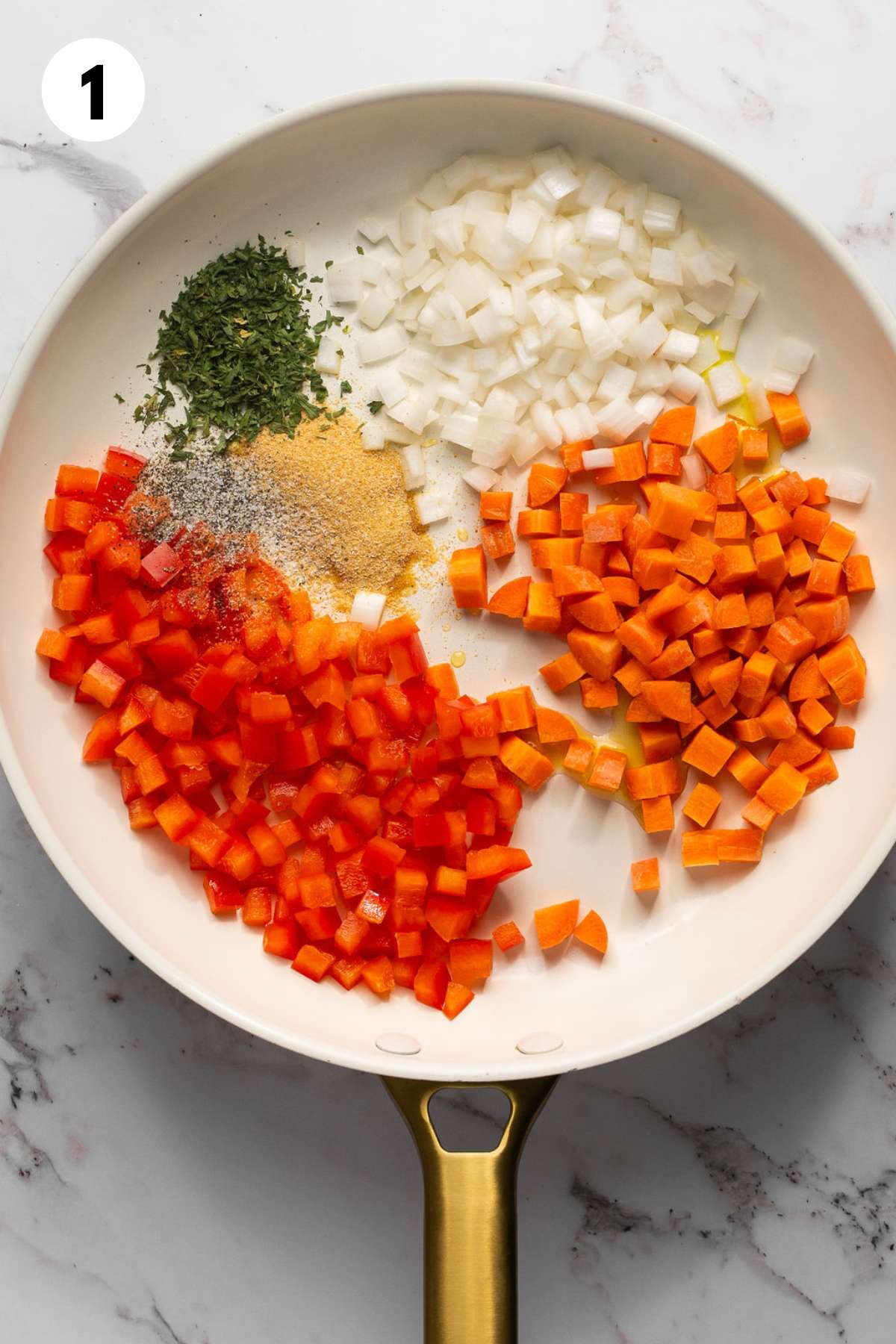 Vegetables and seasonings in a skillet.