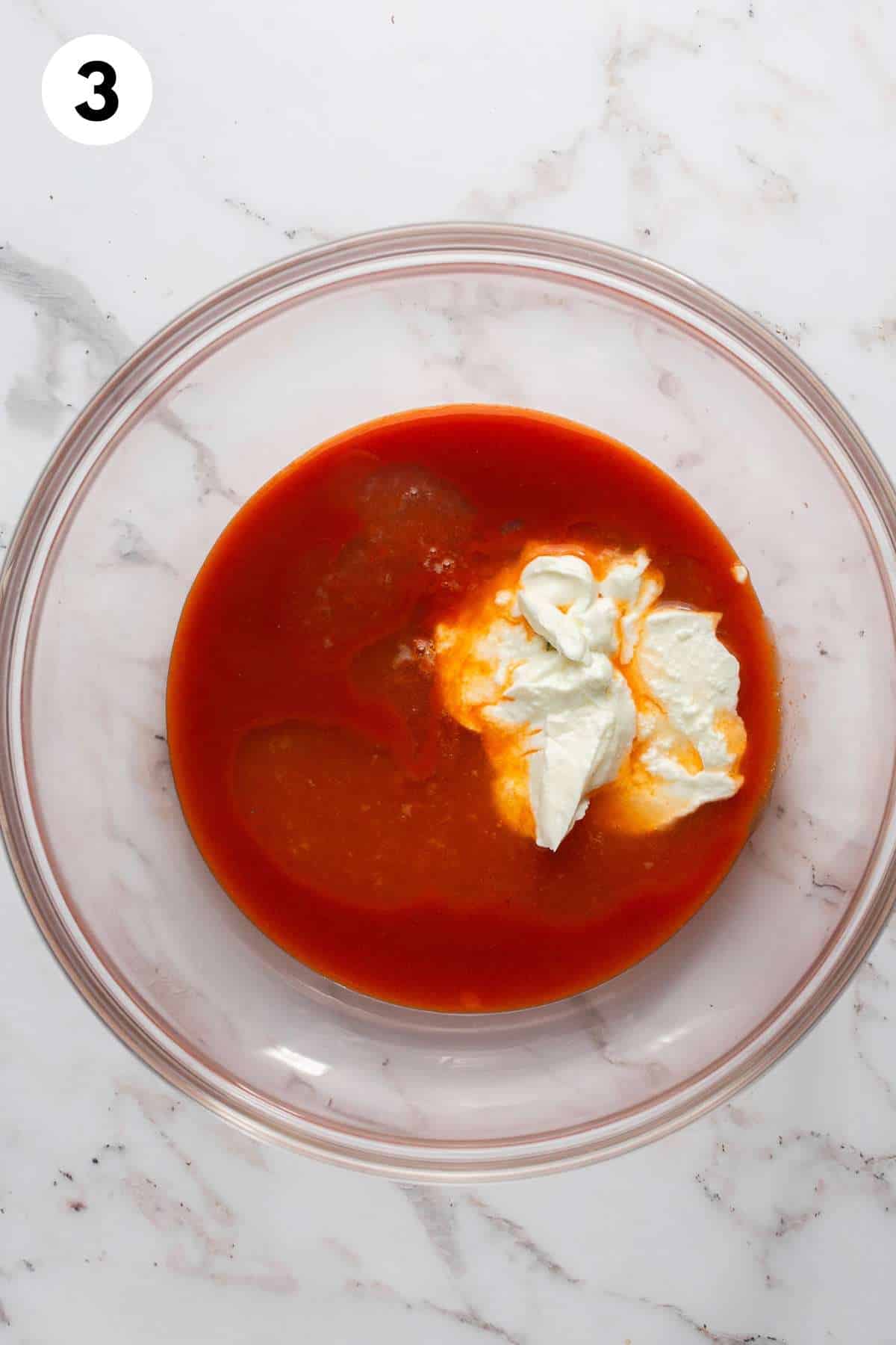 Mix the buffalo sauce with the Greek yogurt.