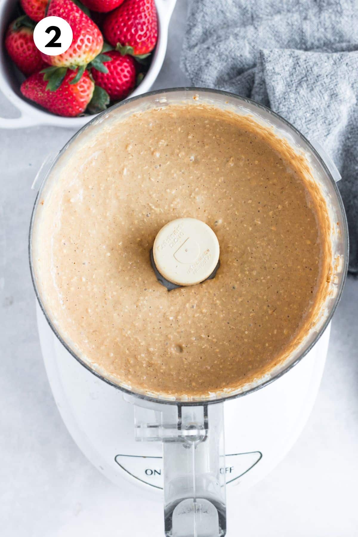 Strawberry muffin batter blended in a food processor.