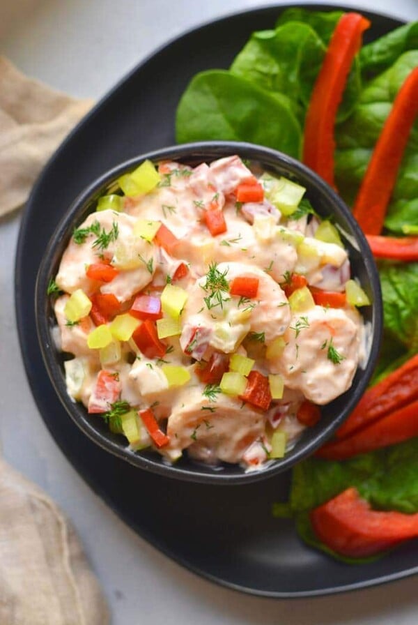 Healthy Greek Yogurt Shrimp Salad is a low calorie, low carb, high protein salad bursting with delicious flavor. An easy lunch or dinner!