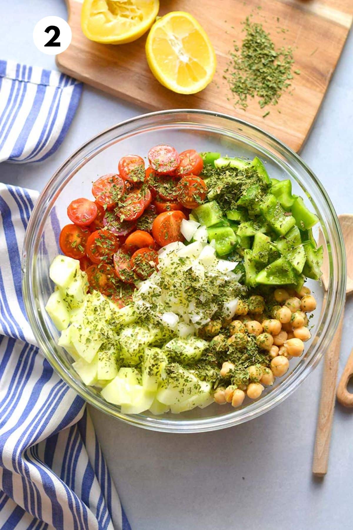 Parsley sprinkled over top of the vegetables and chickpeas.