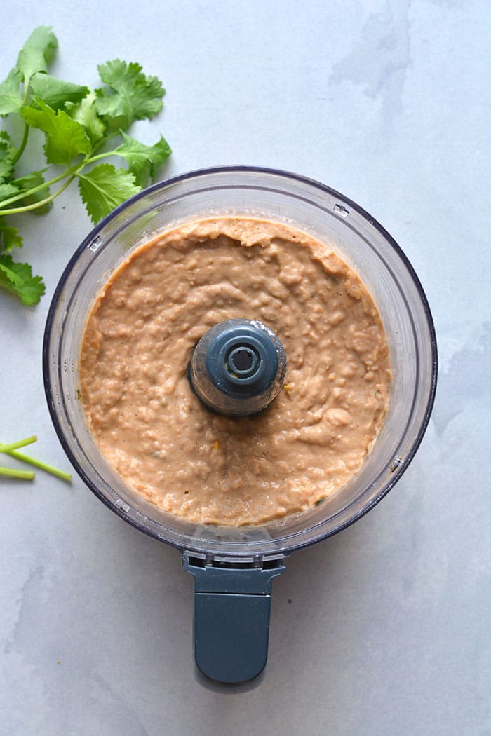 food processor with bean dip inside