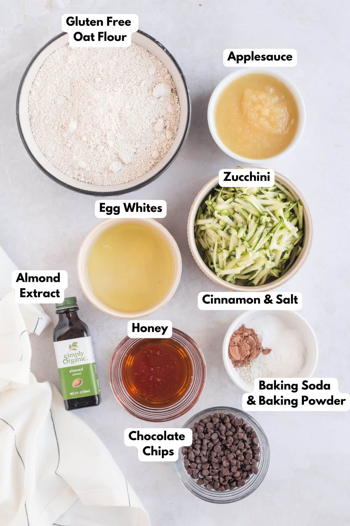Ingredients for making zucchini bread in bowls.