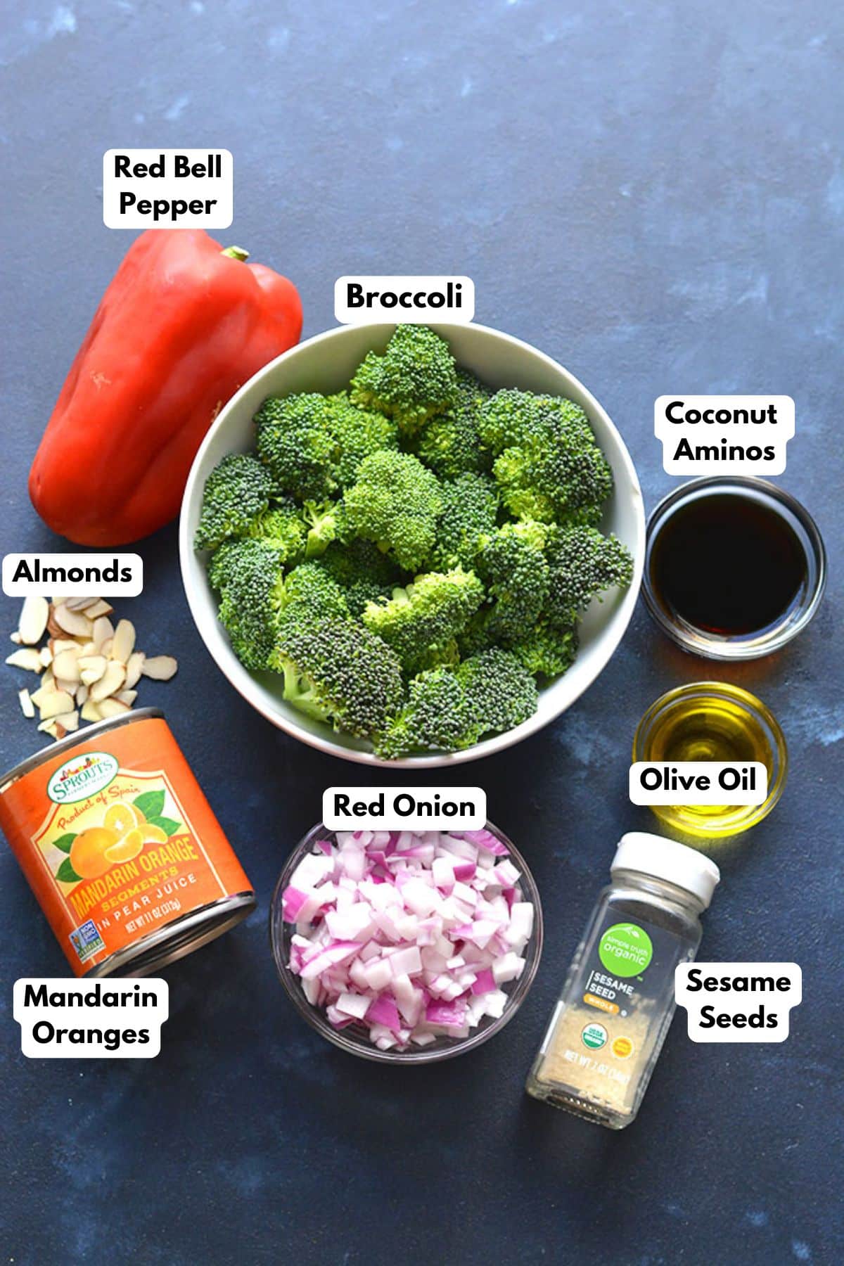 Ingredients on the table to make an Asian broccoli salad.