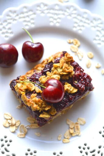 Healthy Cherry Oatmeal Bars are a low calorie, gluten free dessert recipe made low sugar with high fiber oats. A yummy, low calorie treat that's easy to make and dairy free!