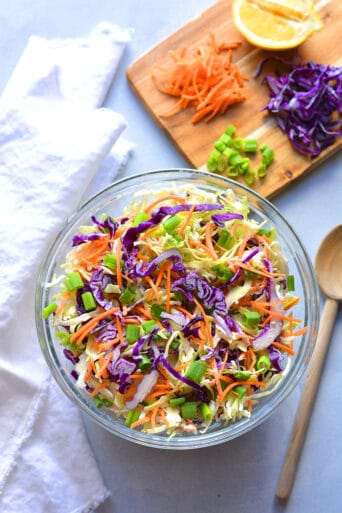 Healthy Low Calorie Coleslaw made with Greek yogurt instead of mayo and no added sugar. This simple, healthy coleslaw recipe is bursting with vegetables and nutrients while being lower in calories and fat.