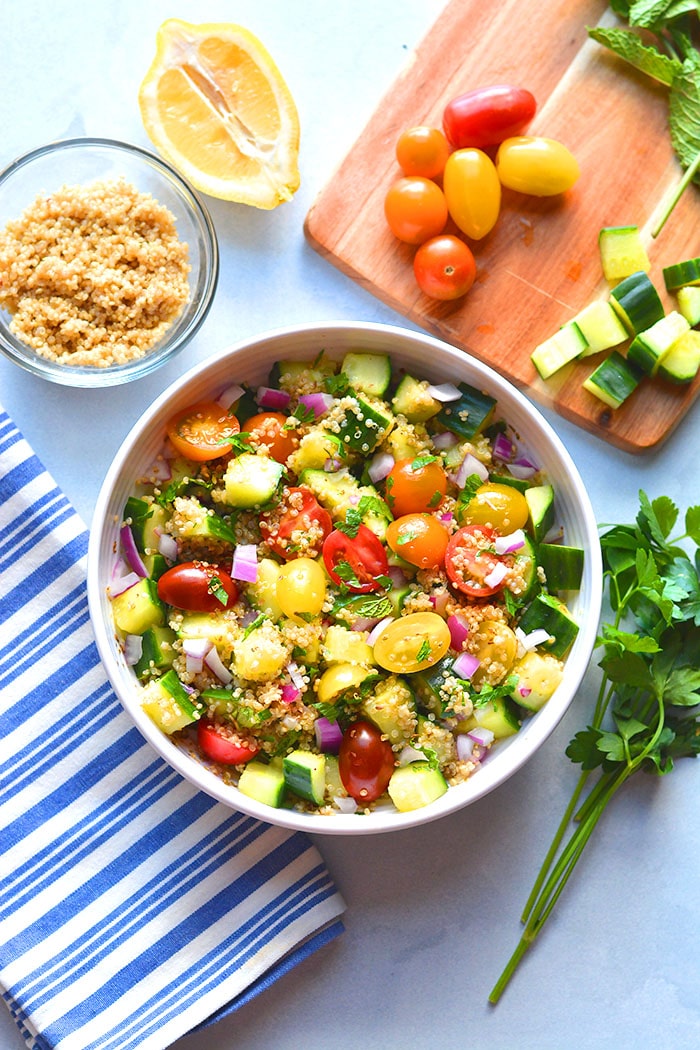 This Healthy Tabbouleh Quinoa Salad has quinoa instead of bulgur. A low calorie Mediterranean salad recipe packed with fresh vegetables.