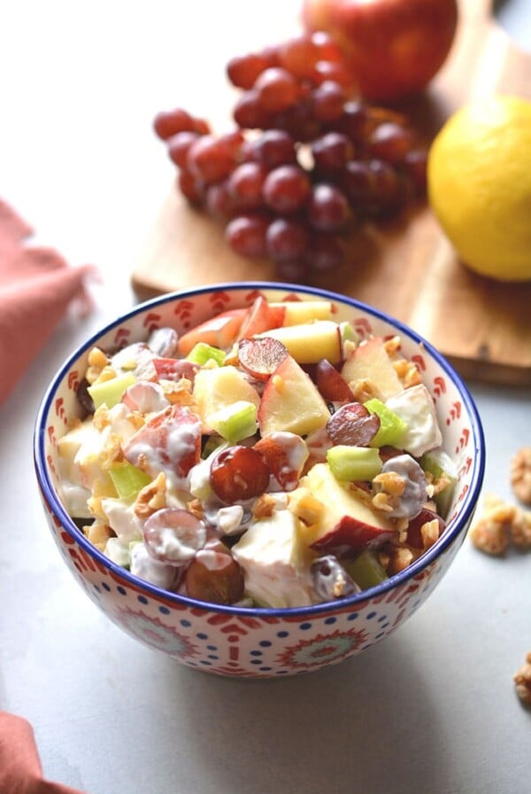 Healthy Waldorf Salad is made low calorie with a creamy, lemon Greek yogurt sauce with no added sugar and no mayo. A healthy side dish or appetizer that's easy to make, naturally gluten free and delicious! Gluten Free + Low Calorie