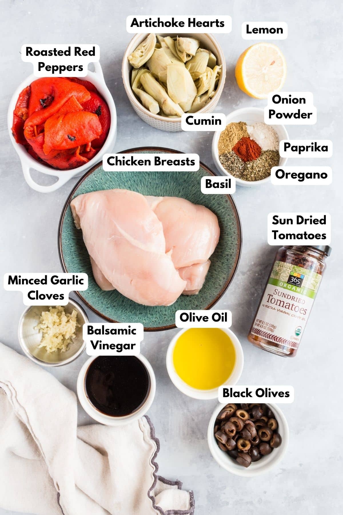 Ingredients for making greek chicken casserole in bowls.