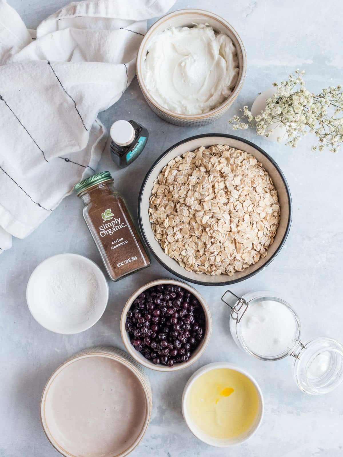 ingredients for blueberry protein oatmeal on the table before preparing. 