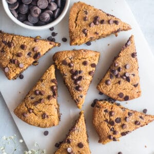 Healthy Pumpkin Scones made low calorie and gluten free with oat flour, minimal added sugar and chocolate chips.