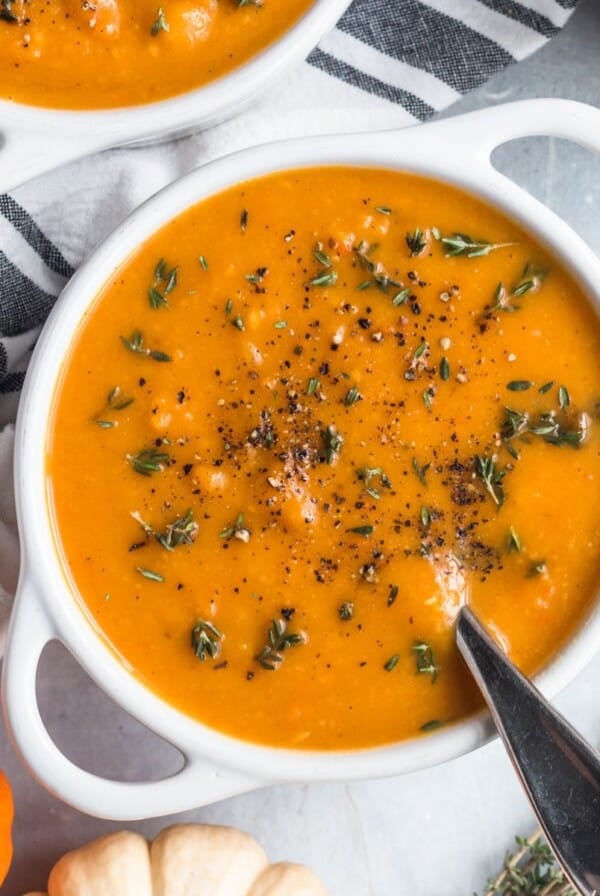 A bowl of butternut squash and sweet potato soup.