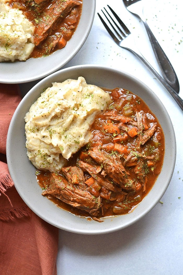 Healthy Crockpot Ragu is loaded with veggies and protein. A cozy meal that's incredibly hearty and delicious, gluten free, low calorie and Paleo friendly! Perfect for meal prepping ahead of time or for a weeknight meal that's virtually effortless. Gluten Free + Paleo + Whole30 + Low Calorie