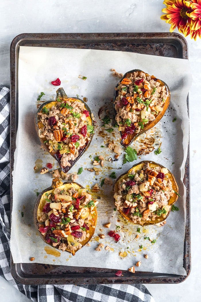 Healthy Stuffed Acorn Squash is low calorie, gluten free and delicious. A simple, healthy dinner packed with flavor that's filling, better balanced in nutrition and has fewer calories!