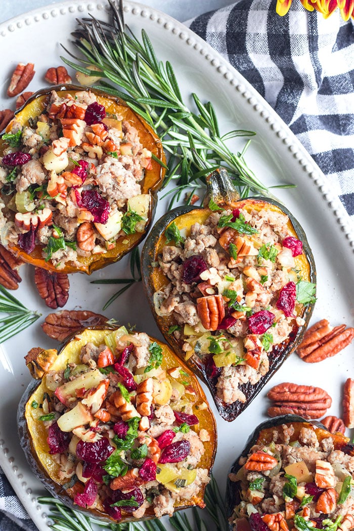 Healthy Stuffed Acorn Squash is low calorie, gluten free and delicious. A simple, healthy dinner packed with flavor that's filling, better balanced in nutrition and has fewer calories!