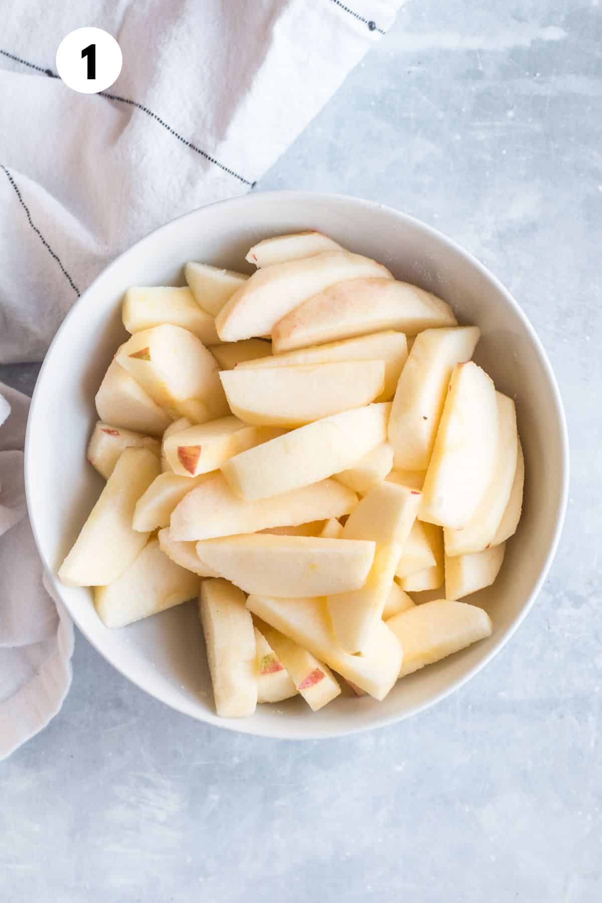 Sliced apples in a bowl.