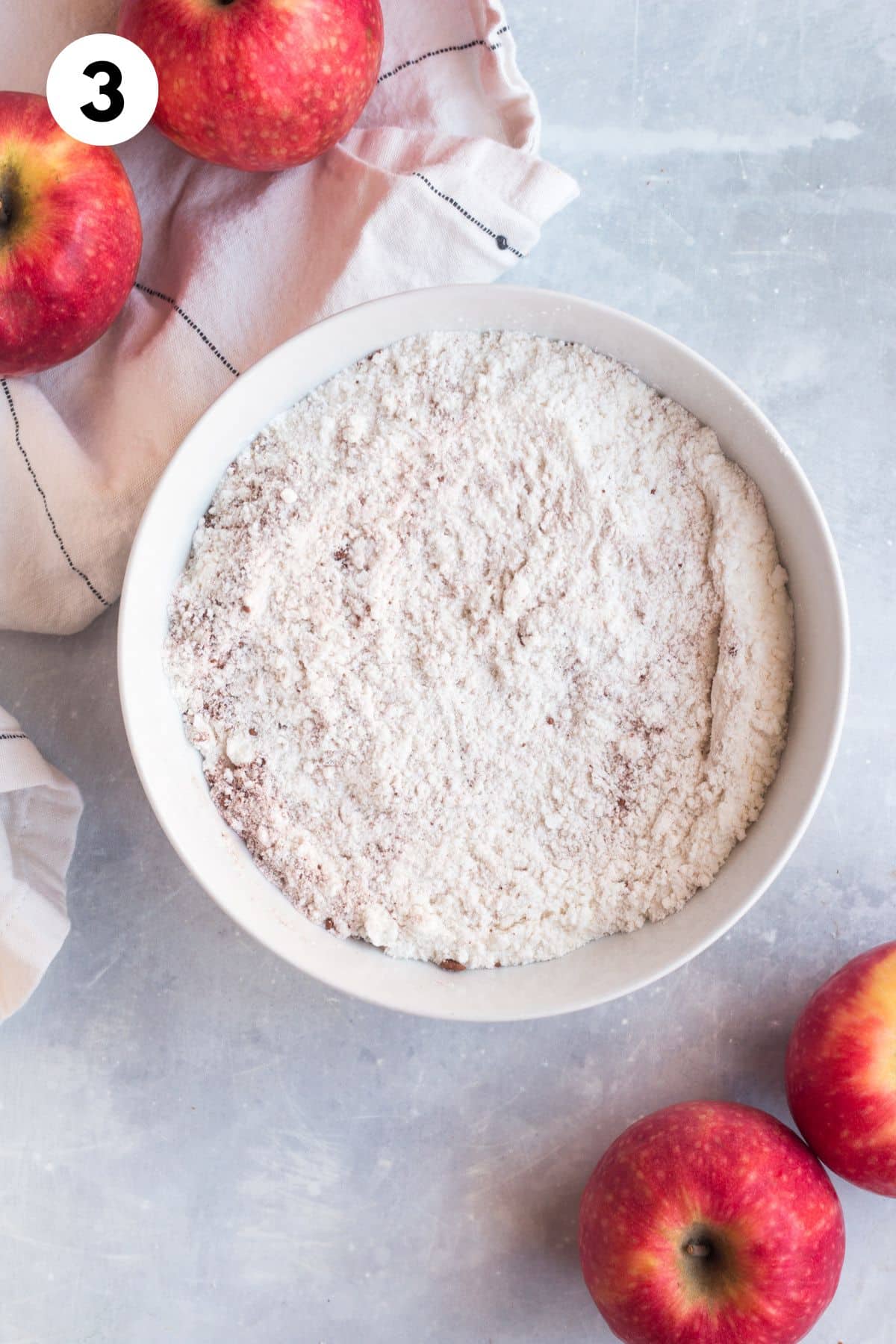 Dry ingredients for making Greek yogurt cake in a mixing bowl.