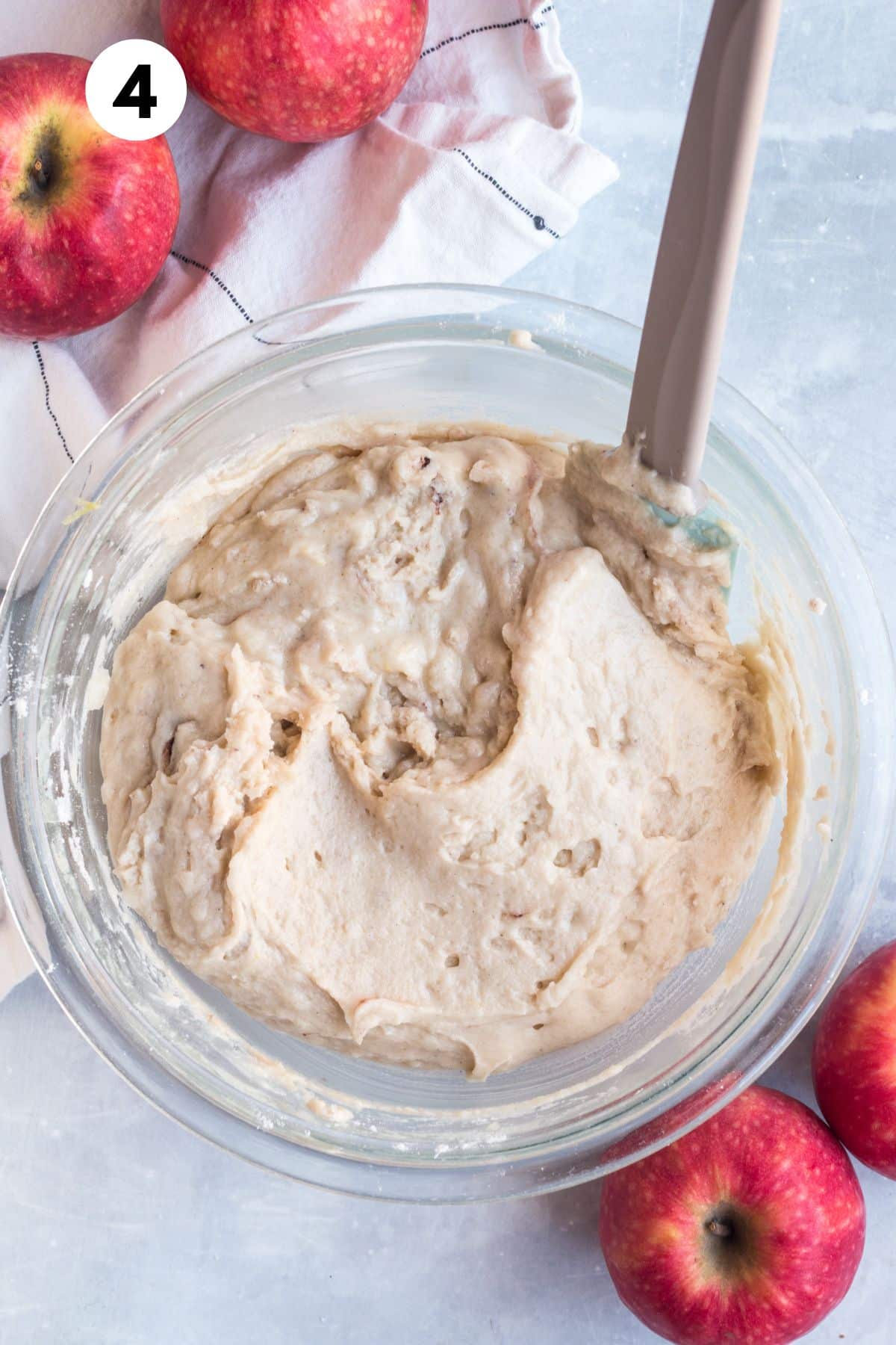 Batter for making Greek yogurt cake mixed together in a bowl.
