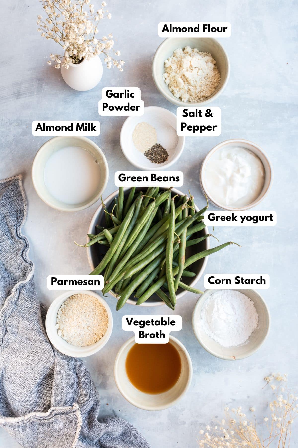 Ingredients for making healthy green bean casserole in bowls.