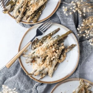 Healthy green bean casserole served on plates.