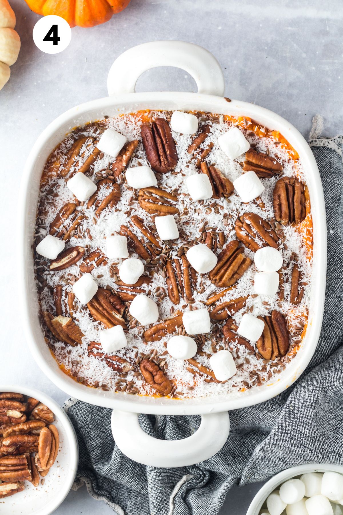 Unbaked healthy sweet potato casserole in a baking dish.