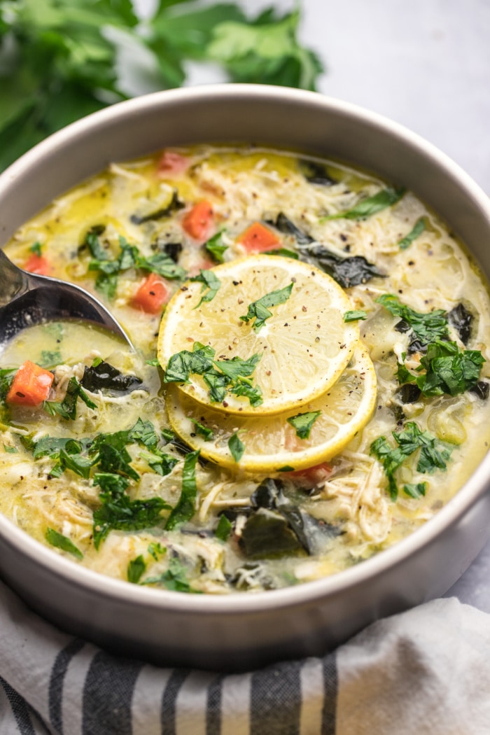 Healthy Greek Lemon Chicken Soup is bursting with delicious flavor. A cozy, low calorie, Paleo and gluten free meal for any time of year! 