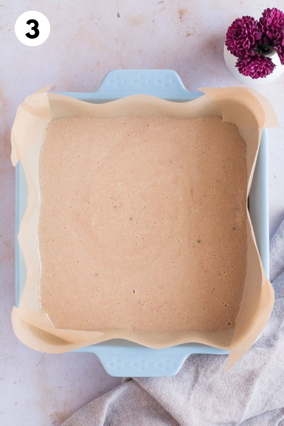 Gingerbread cake mixed in a baking dish.