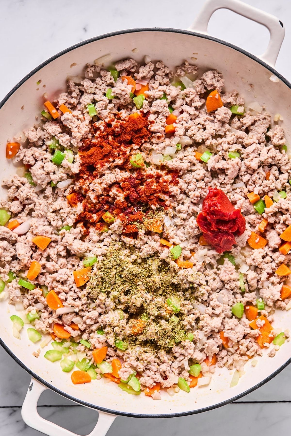 Tomato paste added to the meat and veggies mixture.