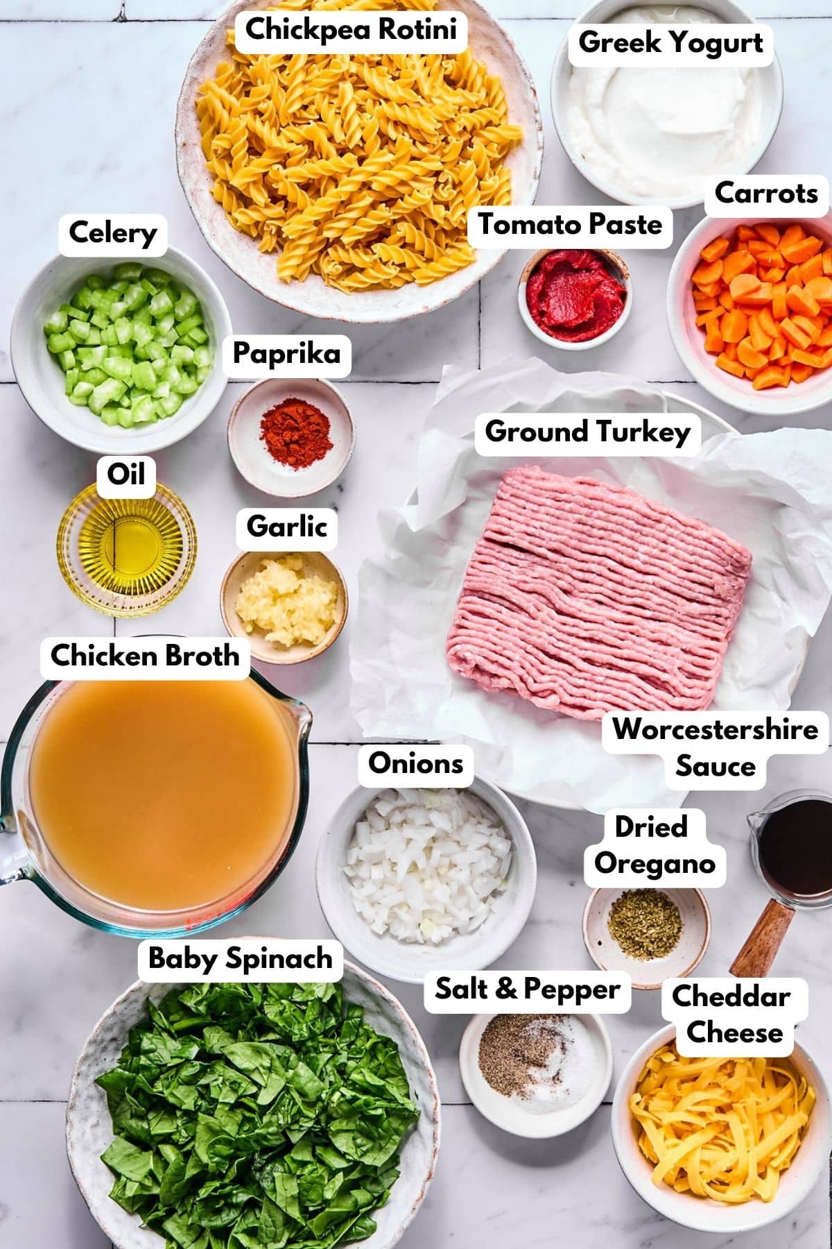 Ingredients for making healthy hamburger helper in bowls.