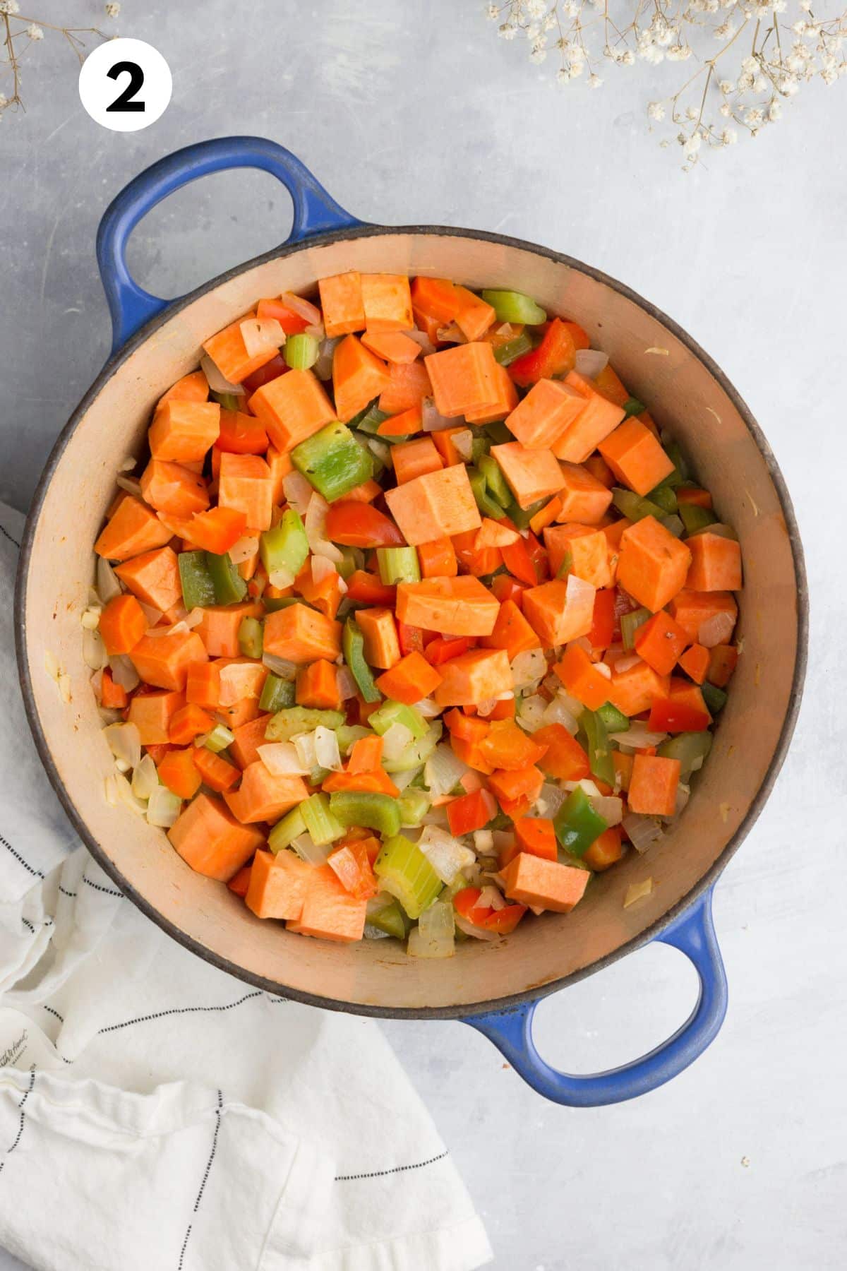 Sweet potatoes added to cook with the other vegetables. 