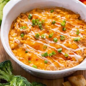 Healthy Buffalo Chicken Dip made low calorie, higher in protein and balanced in nutrition. This delicious appetizer is a crowd favorite!