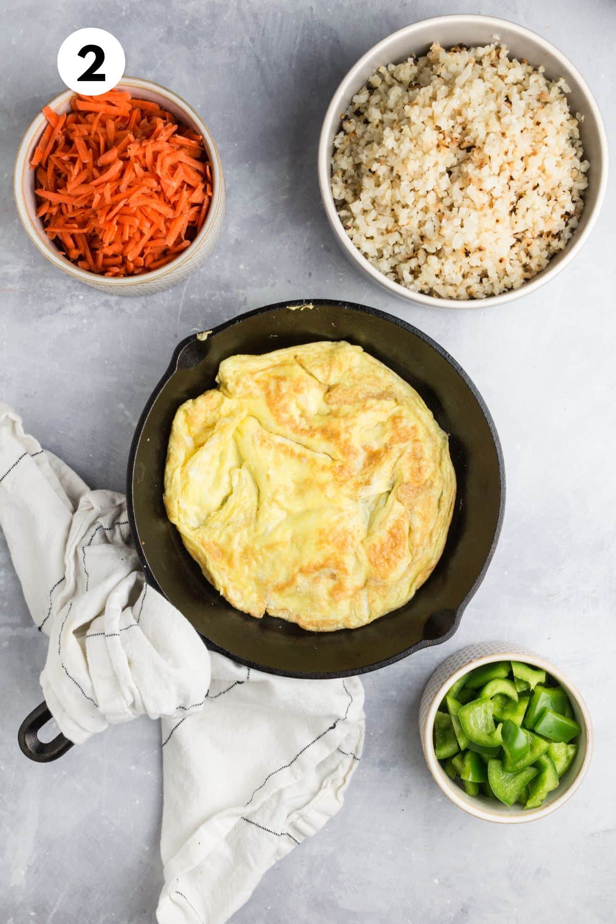Eggs cooking in a skillet.
